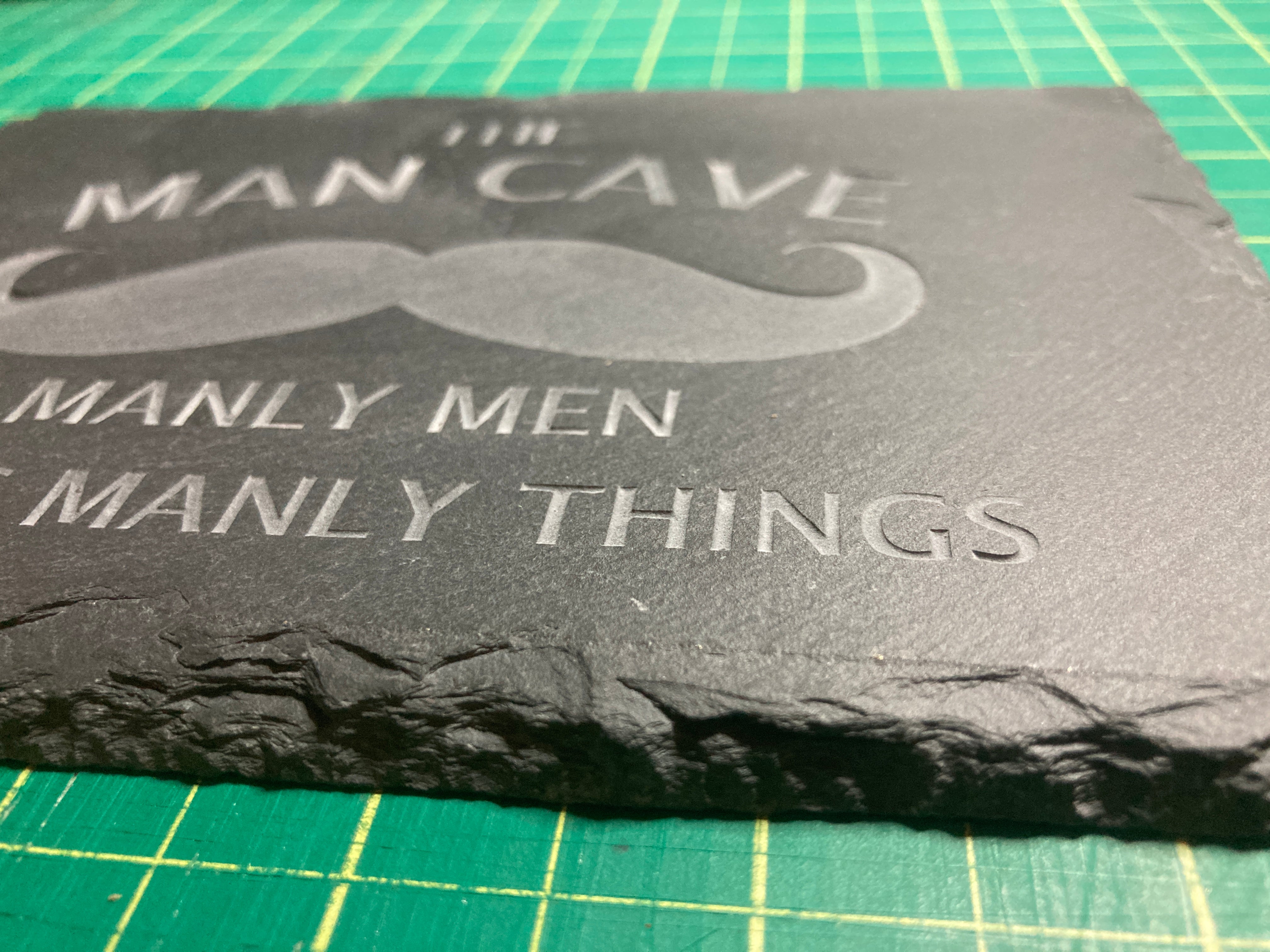 Sand carved slate novelty sign.