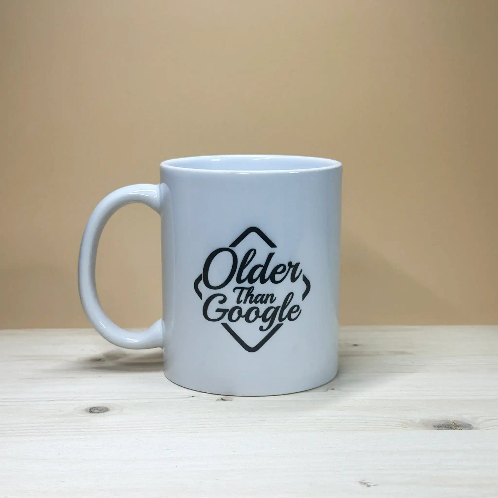 Sarcastic senior citizen gift idea 11oz coffee cup with bold older than google quote.